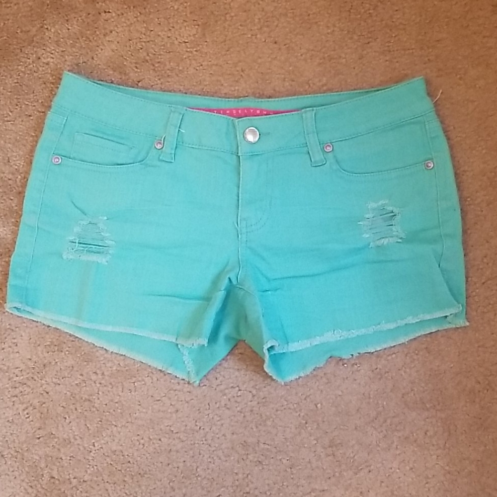 Teal distressed shorts